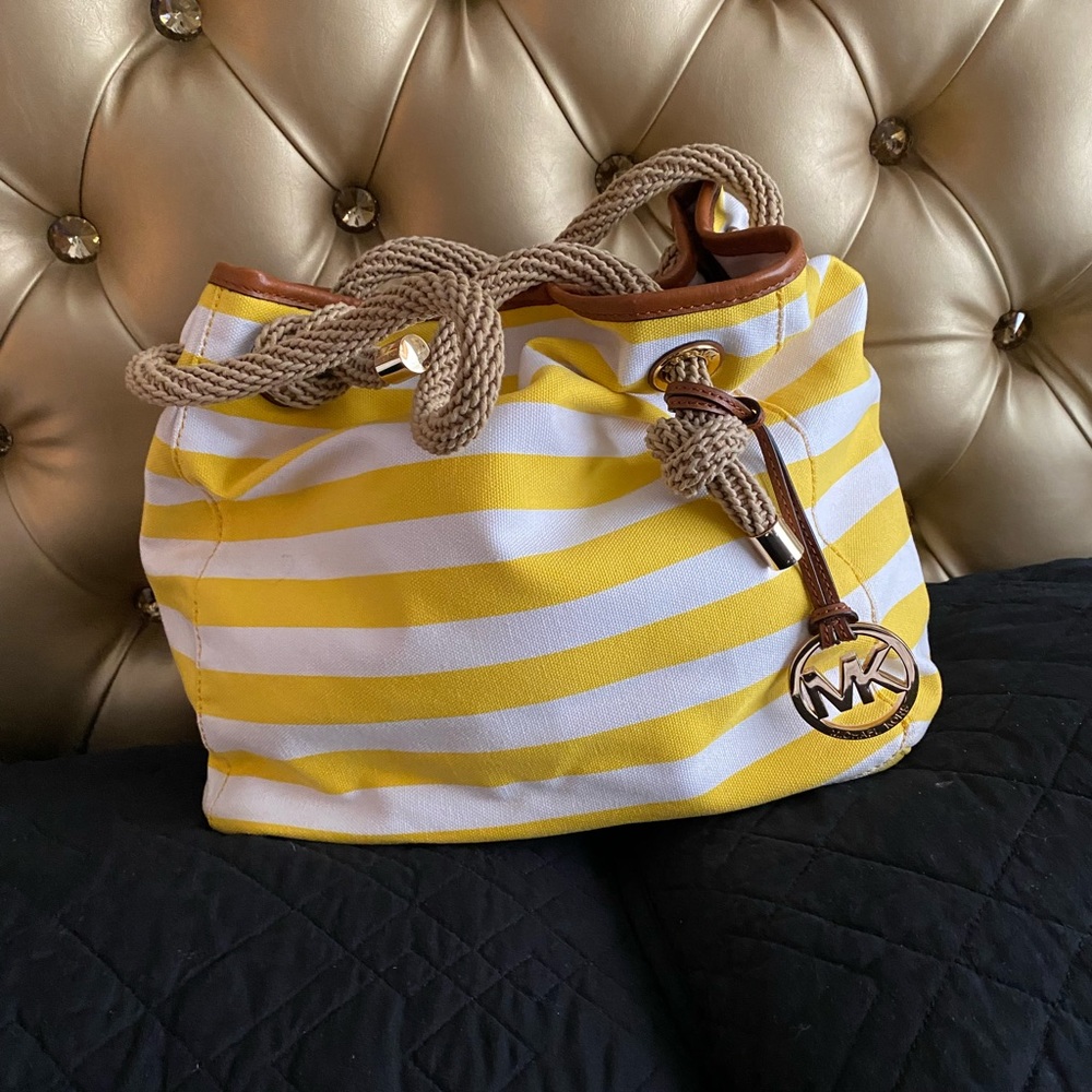 Michael Kors yellow and white stripe rope handbag.